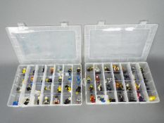 Lego - A collection of 56 x Lego figures including a jester, an astronaut, Maid Marian and similar.
