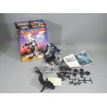 Tomy, Zoids - A boxed Tomy #5900 Zoids 'Mighty Zoidzilla', which is in a deconstructed state,