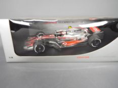 Minichamps - A boxed 1:18 scale Minichamps #503081823 Vodafone McLaren Mercedes MP4-23 2008 'H.