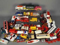 Corgi, Matchbox - A collection of approximately 30 unboxed diecast vehicles in various scales.