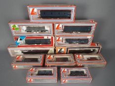 Lima - 12 boxed items of OO gauge freight rolling stock by Lima.