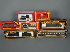 Hornby, Dapol, Mainline - Four boxed OO gauge locomotives with three boxed items of rolling stock.
