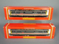 Hornby - 2 x boxed 00 gauge BR Bo-Bo Electric Class 86 locos which have been re numbered and re