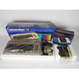 Commodore - Doshisha - A boxed vintage Commodore 64 computer with power transformer and coaxial