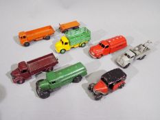 Dinky - A fleet of 8 x commercial vehicles including # 25d Petrol Tank Wagon 1947-48,