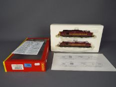 Hornby - A boxed twin loco pack with a pair of class 37 Co-Co Diesel Electrics in weathered EWS