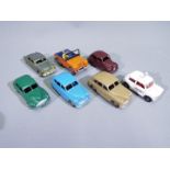 Dinky - A group of 7 x unboxed vehicles including # 40e Standard Vanguard x 2, 40g Morris Oxford,