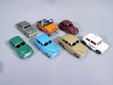 Dinky - A group of 7 x unboxed vehicles including # 40e Standard Vanguard x 2, 40g Morris Oxford,