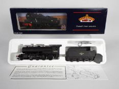 Bachmann - A boxed Bachmann #32-252 OO gauge WD Class 2-8-0 steam locomotive and tender Op.No.