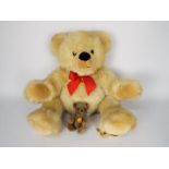 Steiff - two Steiff bears - lot includes a large teddy bear with a yellow tag on its ear and a