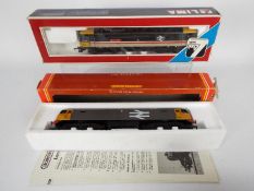 Hornby, Lima - Two boxed OO gauge locomotives.