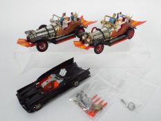 Corgi - 3 x unboxed cars, 2 x Chitty Chitty Bang Bang models # 266 and a Batmobile # 267.