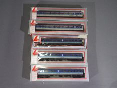Lima - Five boxed OO gauge DMU dummy and centre cars.
