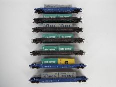 Dapol - A collection of 7 x unboxed # B910 Pocket Wagons with twin shipping container loads.