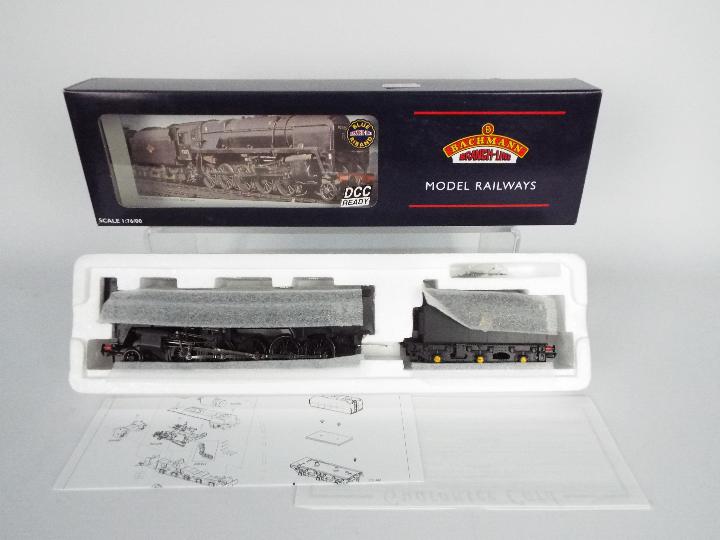 Bachmann - A boxed DCC Ready BR 2-10-0 9F standard operating number 92116 in black livery.