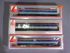 Lima - A boxed OO gauge three unit DMU in Regional Railways livery.