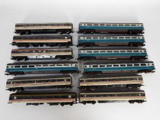 Jouef, Hornby, Lima - A rake of 12 unboxed OO gauge passenger coaches.