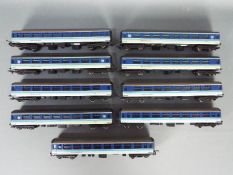 Lima - Nine unboxed OO gauge Lima #305395 Tourist Open Coaches in Regional Railways livery.