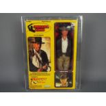 Kenner - A rare graded Kenner 1981 Raiders of the Lost Ark 'Indiana Jones' large 12" action figure.