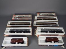 Lima - A collection of 9 x boxed 00 gauge coaches and wagons including 2 x # 305617A3 tanker wagons,