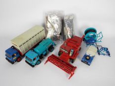 Britains - A collection of trucks and farm equipment including Magirus Deutz Iveco cattle truck,
