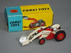 Corgi Toys - A boxed Corgi #53 Massey Ferguson 65 Tractor with Shovel.