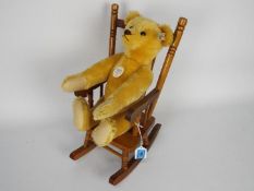 Steiff Bear - A Steiff bear growler with white tag, button in ear, glass eyes, stitched nose,