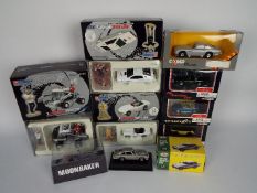 Corgi - Atlas - Universal Hobbies - A collection of 9 x boxed James Bond related vehicles including