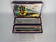 Bachmann - A boxed 158 2 x car DMU set in Regional Railways Express livery. # 31-503.