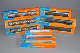 Roco - A collection of 9 x boxed 00 gauge wagons and coaches including 3 x maroon and cream coaches