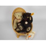 Steiff - Steiff teddy bears - two teddy bears with button and yellow tag in ear and the bears are