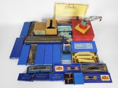 Hornby Dublo - A collection of 20 x boxed items including 11 x track sections,