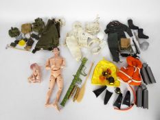 Palitoy - Action Man - A vintage painted hair figure with a missing hand and a collection of spare