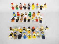 Lego - A group of 40 x loose Lego figures which appear in Good overall condition.
