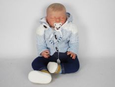 Reborn Doll - A sleeping baby boy doll with hand painted details, closed eyes,