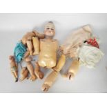 Doll Parts - A quantity of vintage doll parts to include an Armand Marseille doll's head marked
