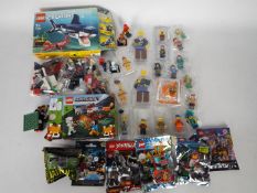 Lego - A collection of 27 x figures, some loose some still sealed,