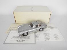 Franklin Mint - a 1:24 scale diecast model Mercedes Benz 300SL (1954), silver grey,