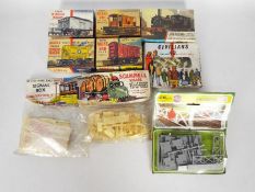 Nine OO gauge plastic model kits by Airfix to include Brake Van, Mineral Wagon, Cement Wagon,