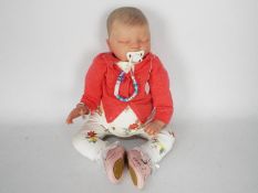 Reborn Doll - A sleeping baby girl doll with hand painted details, closed eyes,