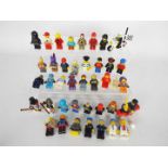 Lego - A group of 40 x Lego figures including Ralph Wiggum and Batgirl,