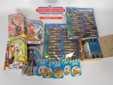 Unused retail stock - 12 x packs of 24 toy pipes, an excess of 800 x Clinton badges,