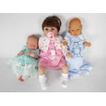 Three reborn / lifelike dolls to include a Berenguer La Newborn example, a Jesmar and similar,