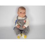 Reborn Doll - Baby boy doll with fixed blue eyes, hand painted details, magnetic mouth and dummy,