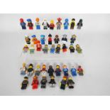 Lego - A group of 40 x loose Lego figures which appear mostly in Good condition.