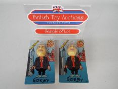 Toy Babblers - Plastic head figures of Gorby (Gorbachev)'s, all unopened in original packaging.