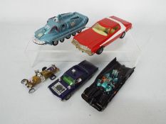 A collection of TV / film related diecast models to include Corgi Batmobile with Batman and Robin