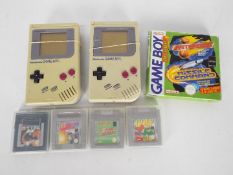 Electronic Games - two Nintendo Game Boys and six games comprising Asteroids / Missile Command,