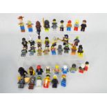 Lego - A group of 40 x loose Lego figures including Woody from Toy Story,