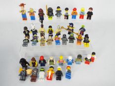 Lego - A group of 40 x loose Lego figures including Woody from Toy Story,